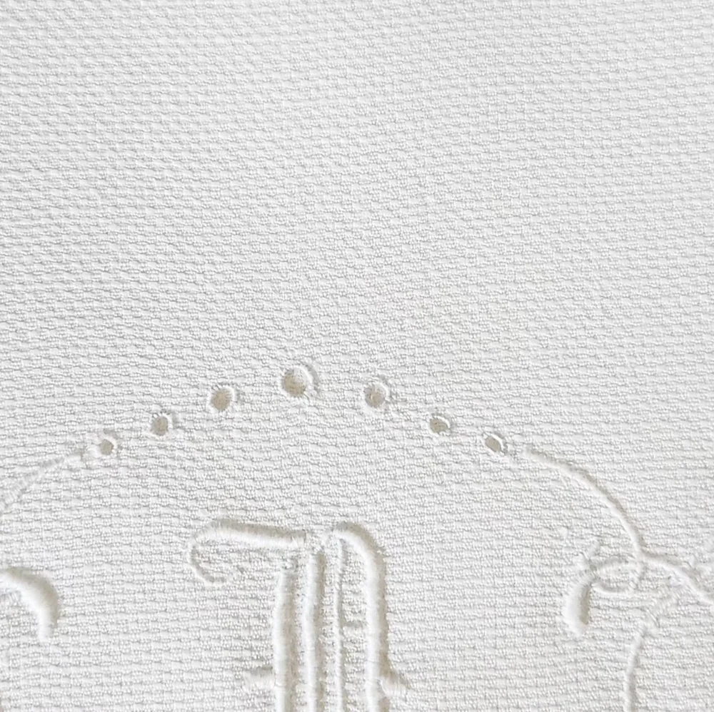 LG EMBROIDERED HUCK TOWEL WITH A MONOGRAM